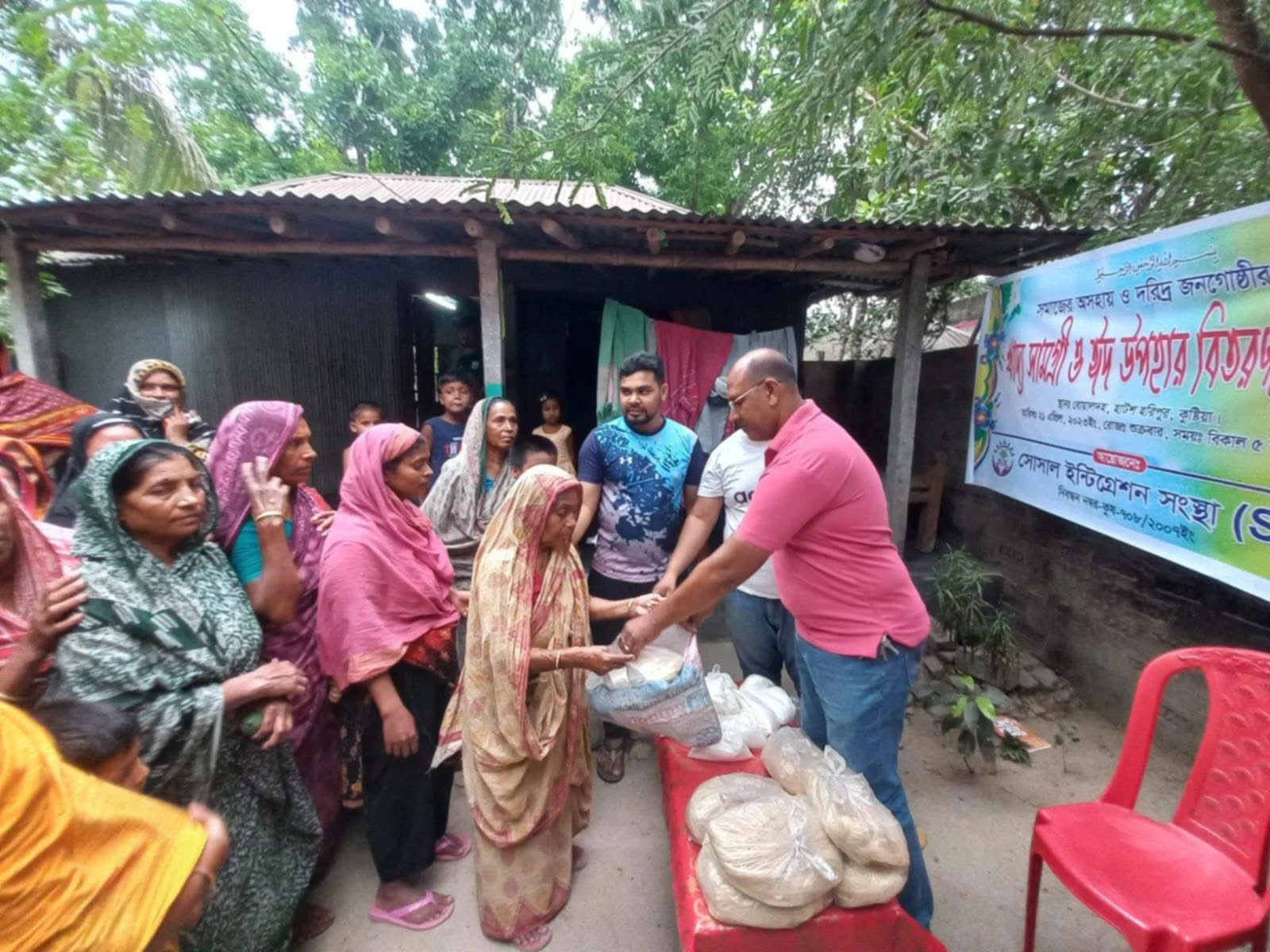A group receiving packaged supplies