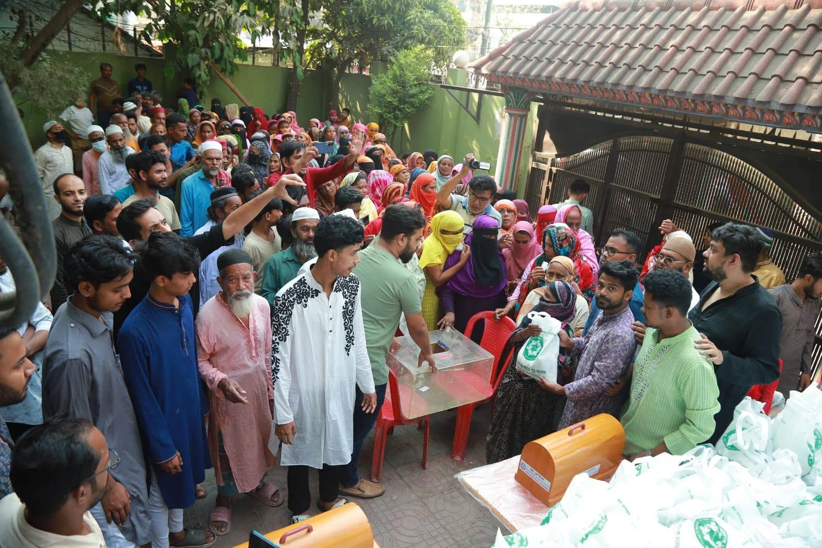 People gathered for an outdoor distribution